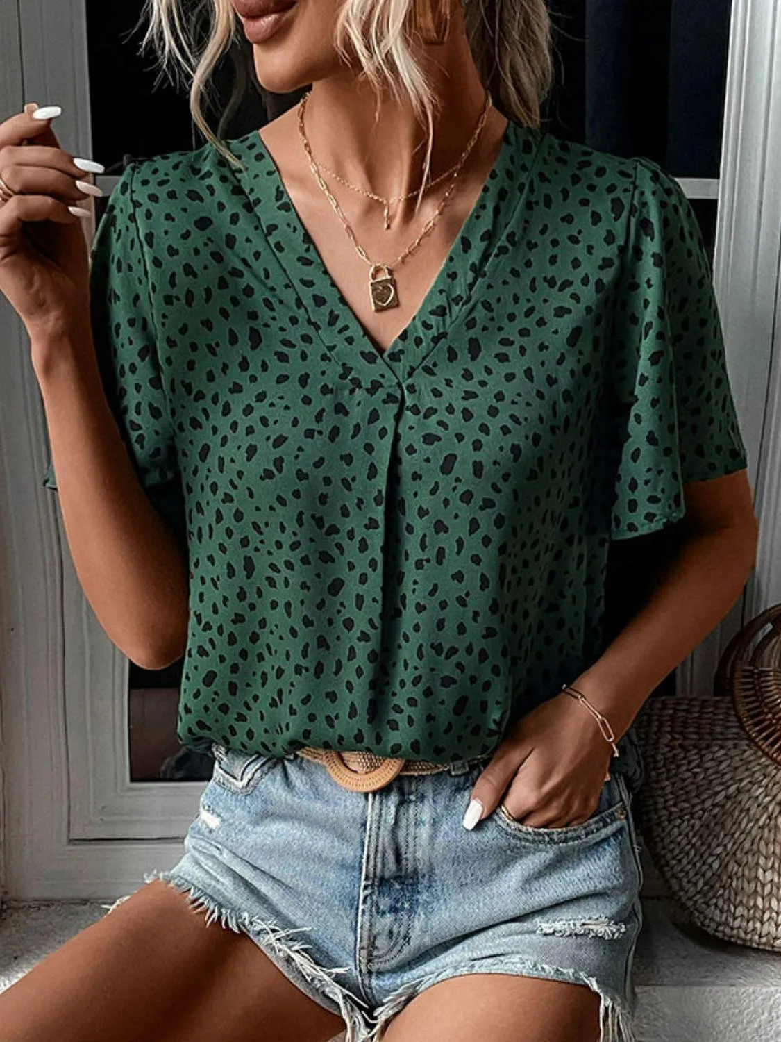 Fighter Animal Print Green V Neck Blouse